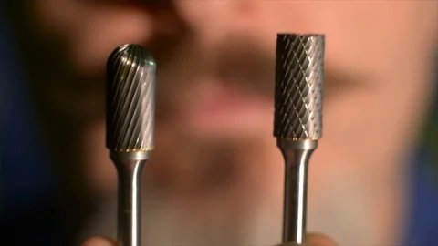 A man holds two borfreses Stock Footage 111661995