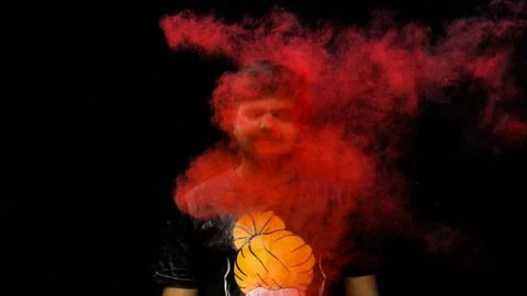 Man with holi colors Stock Photos