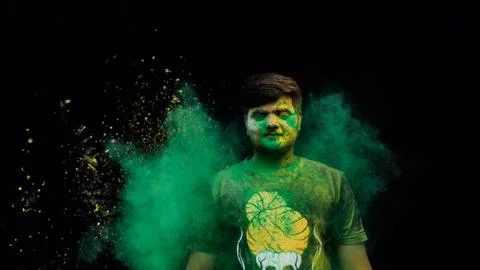 Man with holi colors Stock Photos