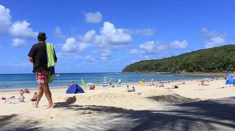 Man on holiday at beach Stock Footage 45533569