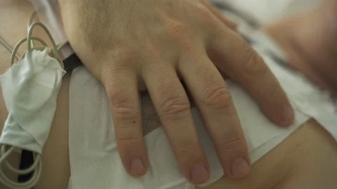 A man with a holter installed reveals malfunctions in the cardiovascular system. Stock Footage 238660307