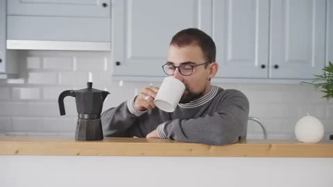 Man at home having coffee. Stock Footage 142064980