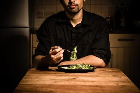Man at home having dinner 스톡 사진