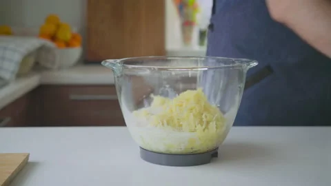 A man at home makes mashed potatoes Stock Footage 201588714