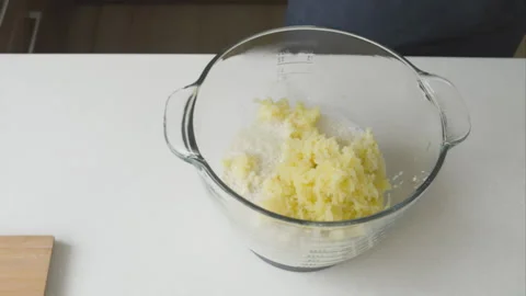 A man at home makes mashed potatoes Stock-Footage 220190323