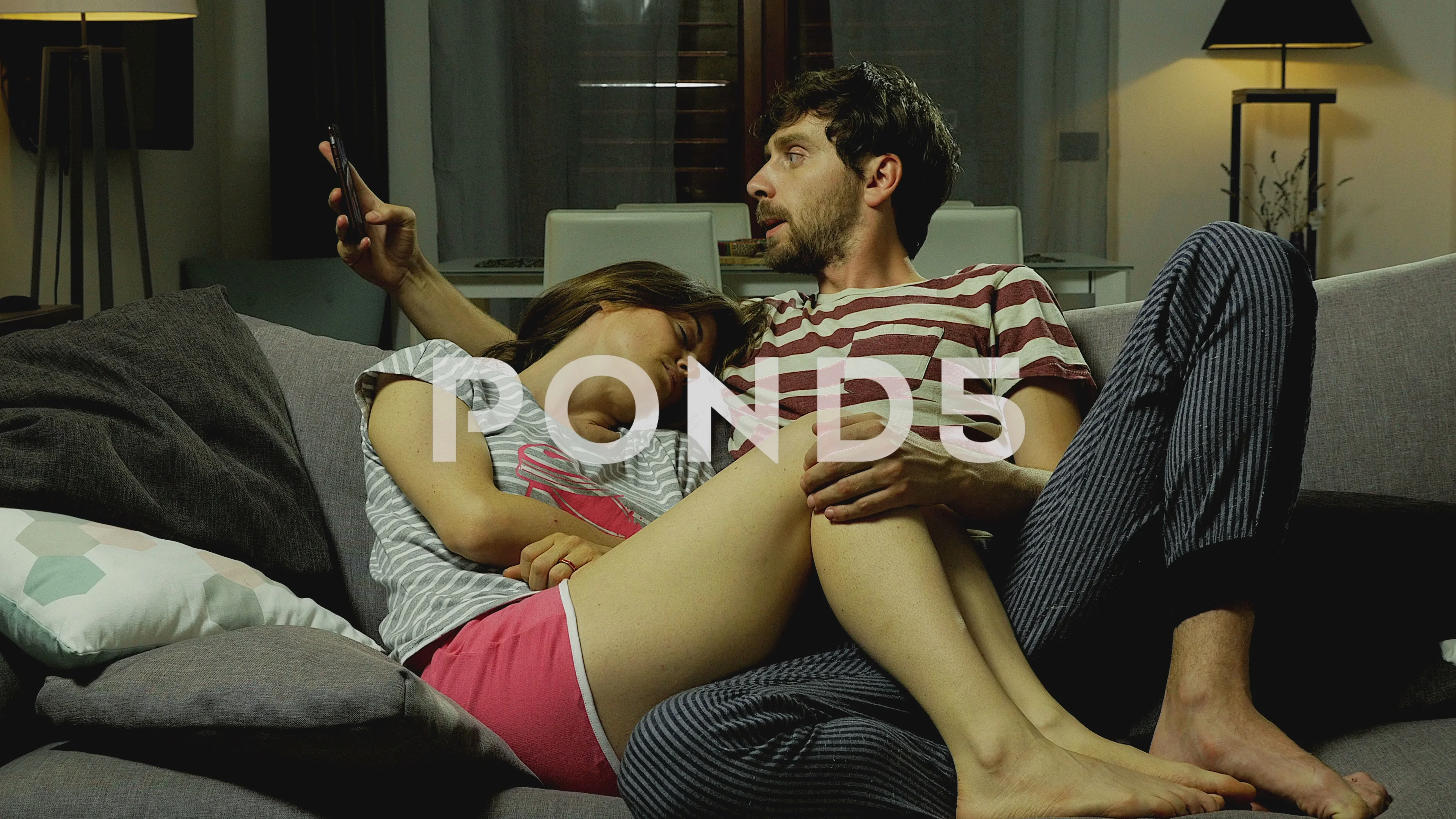 Man at home at night cheating on wife sending text message to lover 4K