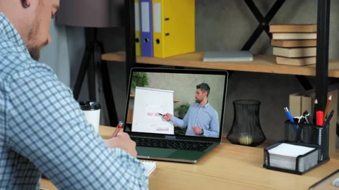 Man at home office study online video call webcam laptop, smiling listen teacher Stock Footage 157443443