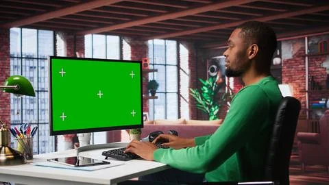 Man at home using mockup on pc preparing presentation slides Stock Photos