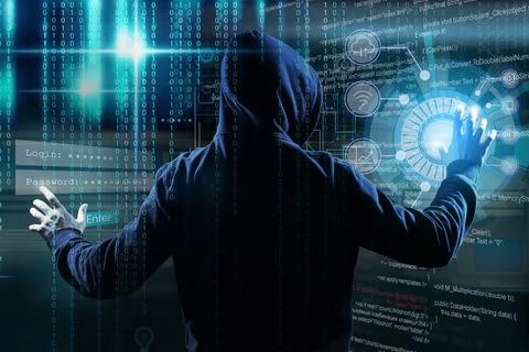 Man in hood and digital code on dark background, back view. Cyber attack conc Stock Photos