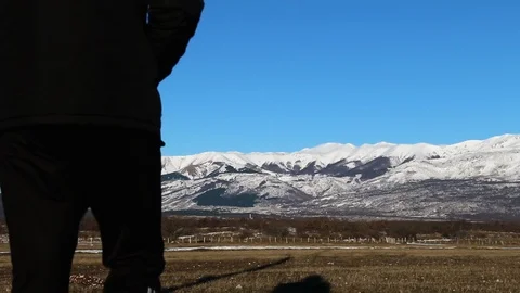 Man in hood walking Stock Footage 108555958