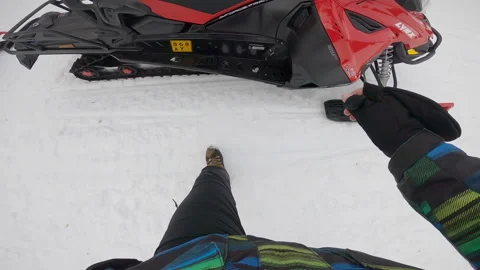 Man hopping on a red snowmobile in winter, action shot, first person view 스톡 동영상 149396961
