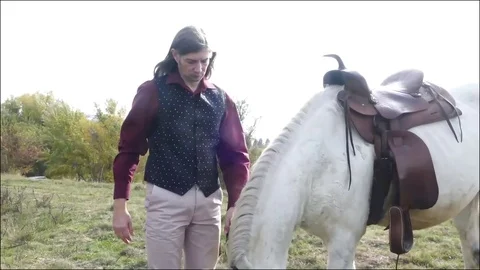 Man with horse 9 Stock Footage 82082359