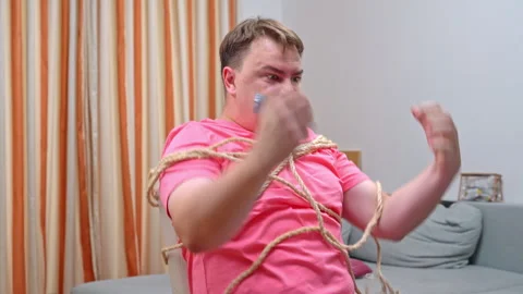 Guy Tied Up Stock Videos – Royalty-Free HD & 4K Videos