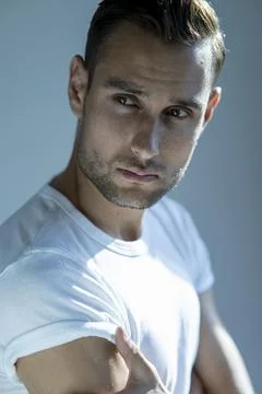 Man H&amp;S close up studio white T shirt Stock Photos