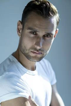 Man H&amp;S close up studio white T shirt Stock Photos