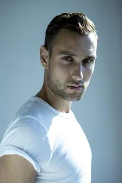 Man H&amp;S close up studio white T shirt Stock Photos