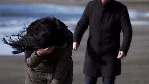 Man hugging girlfriend crying for loss grieving Stock Footage 118644057
