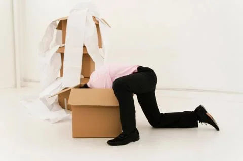 Man hunts for lost data in boxes 스톡 사진