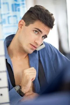 Man in a hurry front of  mirror Stock Photos