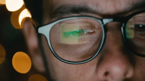 Man Hypnotized By The Lights Of His Phone Stock Footage 321372422