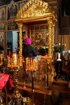 The man at the icon. Stock Photos