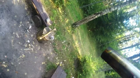 Man ignites fire in the camp. Man starts campfire at camp Stock Footage 53503922