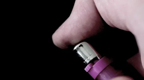 Man ignites lighter slow motion Stock Footage 8351784