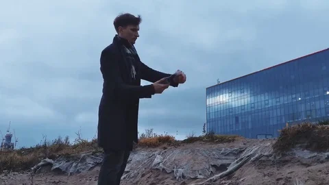 Man Igniting and Throwing Molotov Cocktail Video stock 69155468