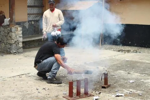 Man Igniting Cracker Bomb Stock Photos