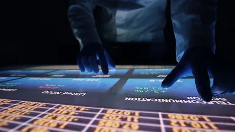 Man indicators on sensor touch screen sensory interactive table in the dark. Stock Footage 106339692