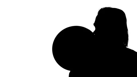 Man inflating a balloon Video stock 77652860