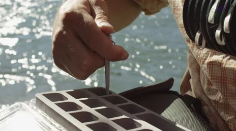 Man injecting in tackle box Stock Footage 59899363