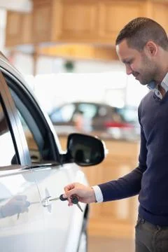 Man inserting a car key Stock Photos