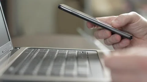 Man inserting credit card number on mobile phone, close-up Stock Footage 270477777