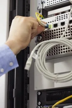 Man inserting USB wire Stock Photos