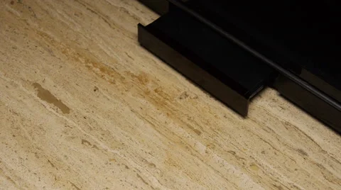 Man inserts and removes DVD from DVD player Stock Footage 53204394