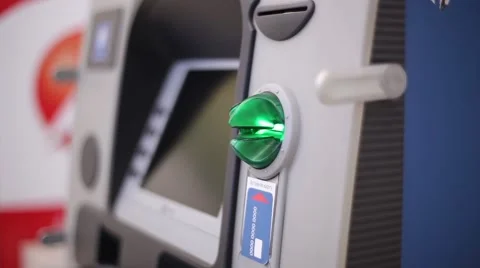The Man Inserts A Card The Cash Dispenser Stock Footage 63767385