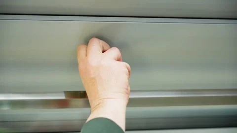 The man inserts the key into the lock and opens the door. Stock Footage 317151108