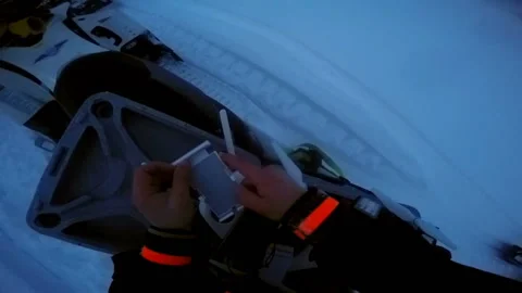 Man inserts the phone into the remote from the drone Video stock 102162425