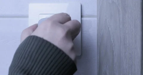 Man Inserts Plug Into Electrical Socket Stock Footage 126912439