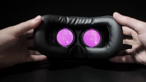 Man inserts a smartphone in the helmet of virtual reality and brings to the.. Stock Footage 72922917