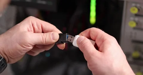 Man inserts USB flash drive into USB cable adapter slow motion 4k movie Stock-Footage 256091156