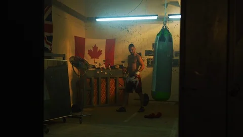 Man inside a boxing studio Stock Footage 100036787
