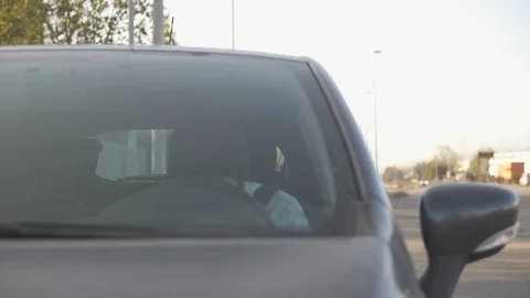 Man inside Car grabs Wheel and Screams Video stock 88871338