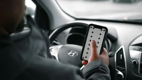 Man Inside Car Tapping Middle Of Phone Stock Footage 166522855