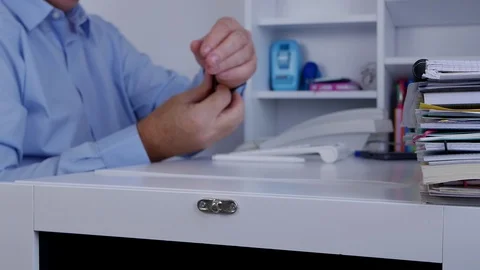 Man Inside Office Room  Check Wristwatch Function and Turn On Clock Mechanism Stock Footage 98588563