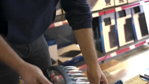 The man is inspecting a meat tenderizer Vidéo 279051998