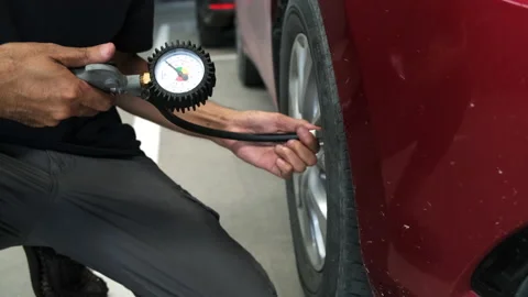 Man inspection Measure quantity Inflated Rubber Stock-Footage 140001413