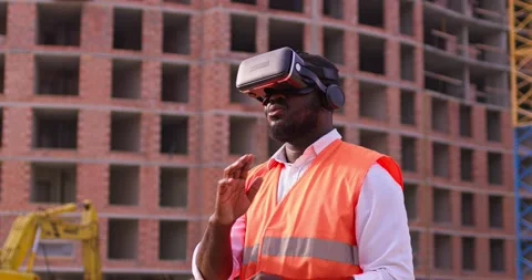 Man inspector analyzing the work of builders using virtual reality glasses Stock Footage 172288997