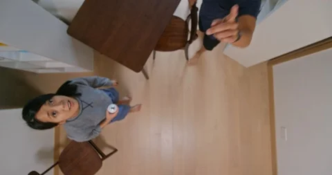 Man install the lamp on the ceiling with... | Stock Video | Pond5